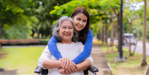 A mother and daughter who is a caregiver